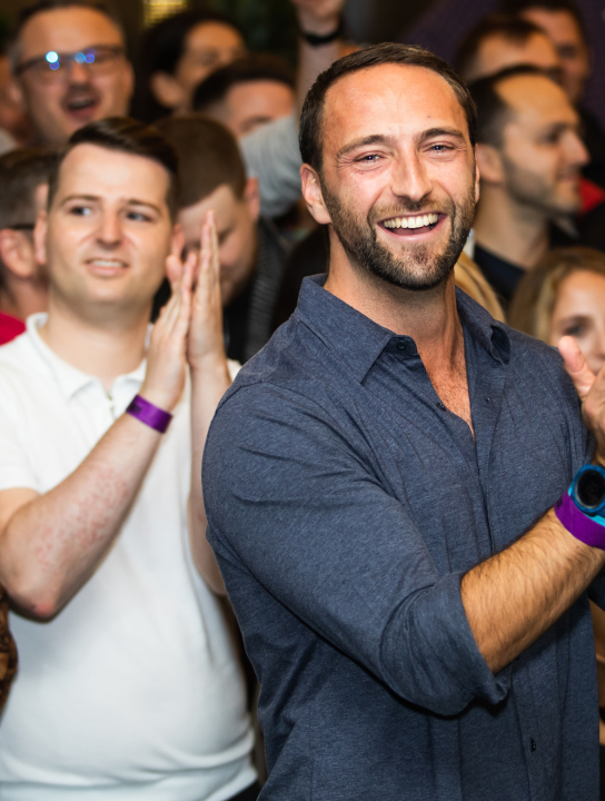 Matt Doltis, Head of Data at YuLife working with a smile